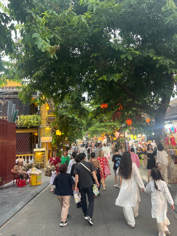 Lanterns, bougainvillea, and old architecture in Hoi An