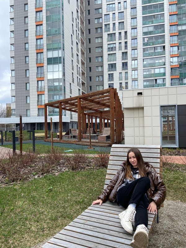 Woman photographed in casual urban photoshoot across Izhevsk parks
