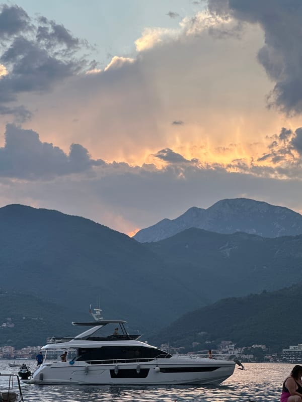 Bay views, a stone church, and hillside roads in coastal Montenegro
