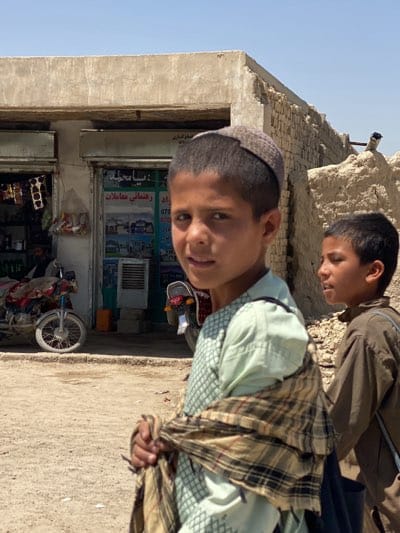 Morning street life documented in Afghan village