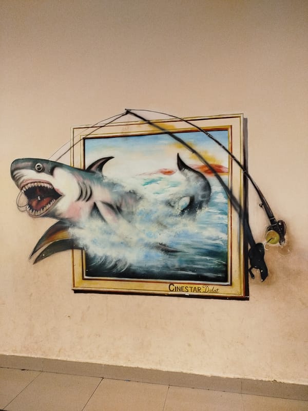 Trompe-l'oeil shark and dinosaur artworks documented at unknown location