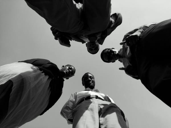 Four people gather in Keffi, Nigeria