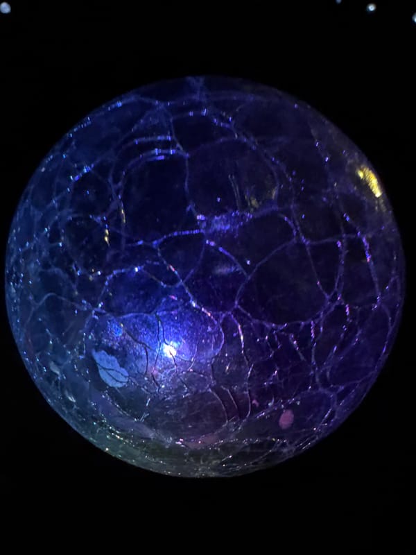 Macro shots of glowing cracked glass spheres in rural Bulgaria