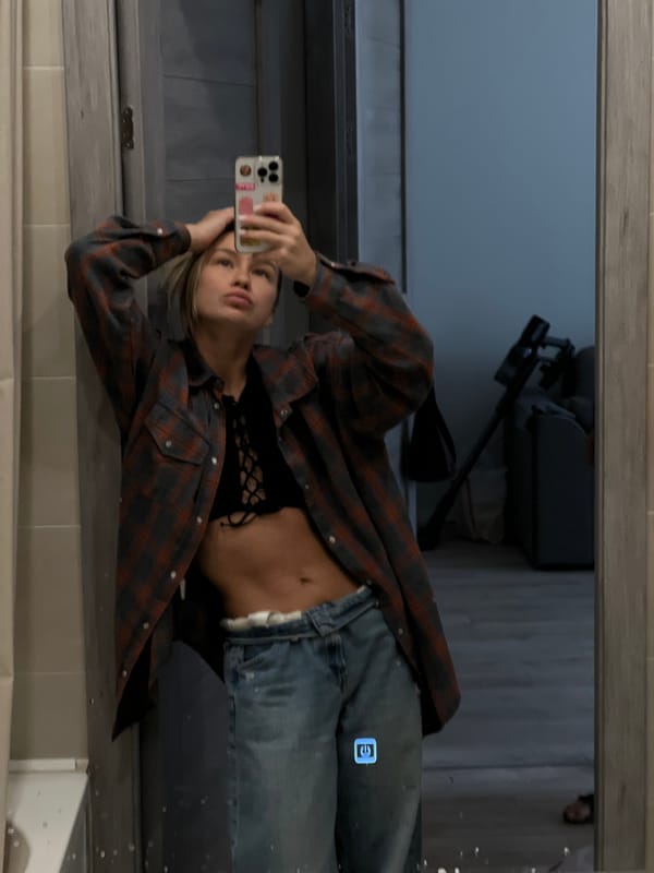 Person takes bathroom selfie in Svkh Voronezhskiy, Russia