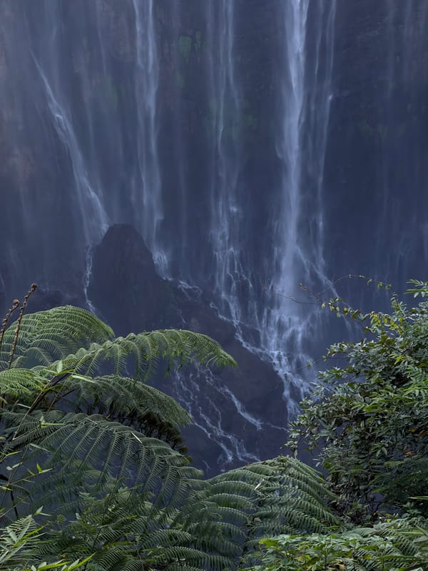 Waterfall and volcano views at a jungle site in East Java