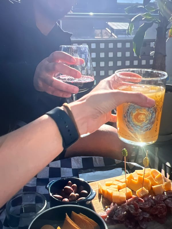 Casual toast and food spread with a #FeedtheFeed tag