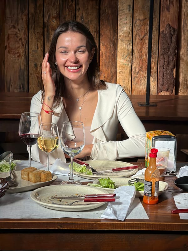 Diners enjoy traditional grilled meat meal in Funchal, Portugal