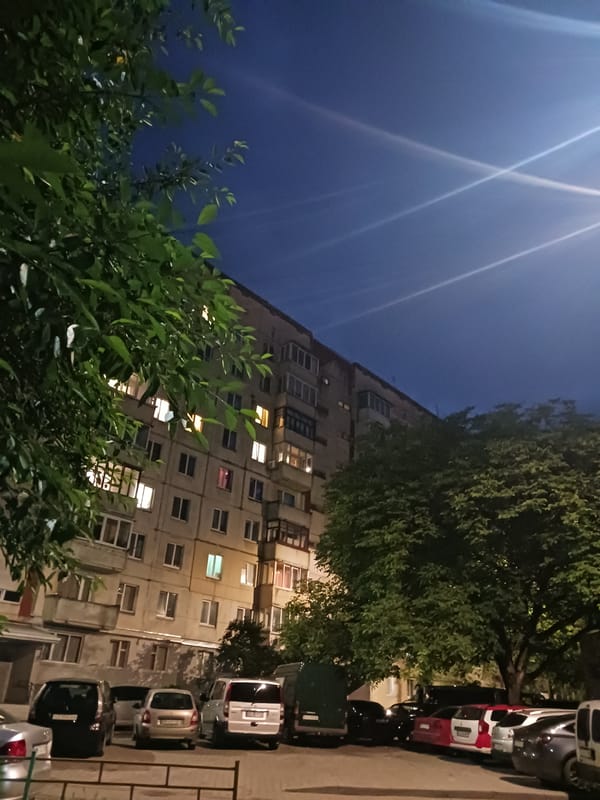A summer evening in and around an apartment building