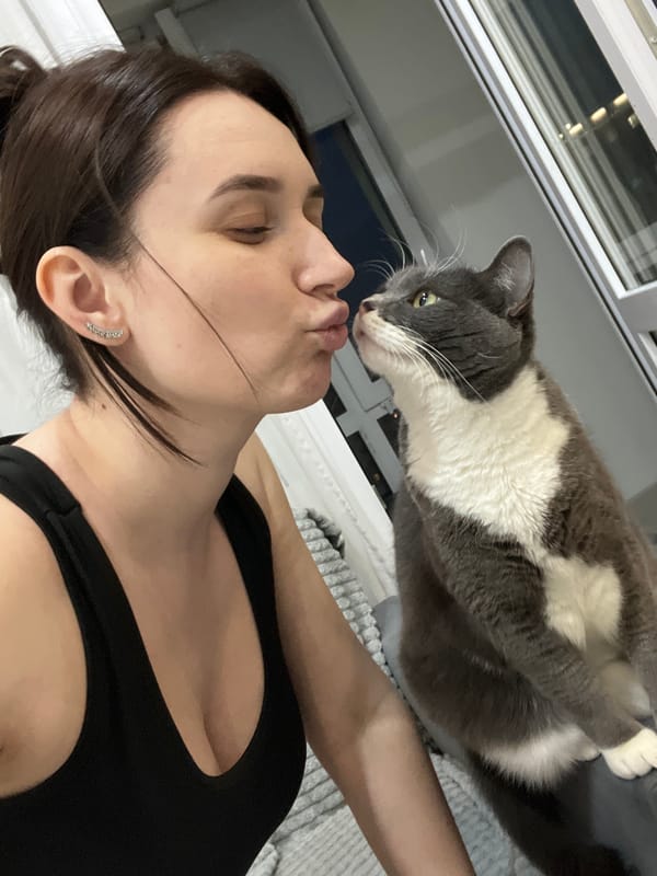 Woman and cat captured in quiet domestic moments in Tyumen