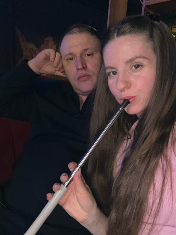 Couple enjoys evening at hookah lounge in Klin, Russia