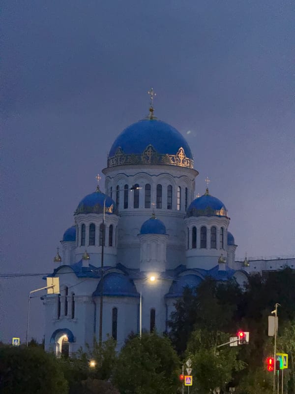 Evening scenes captured at Surgut cathedral and bull sculpture