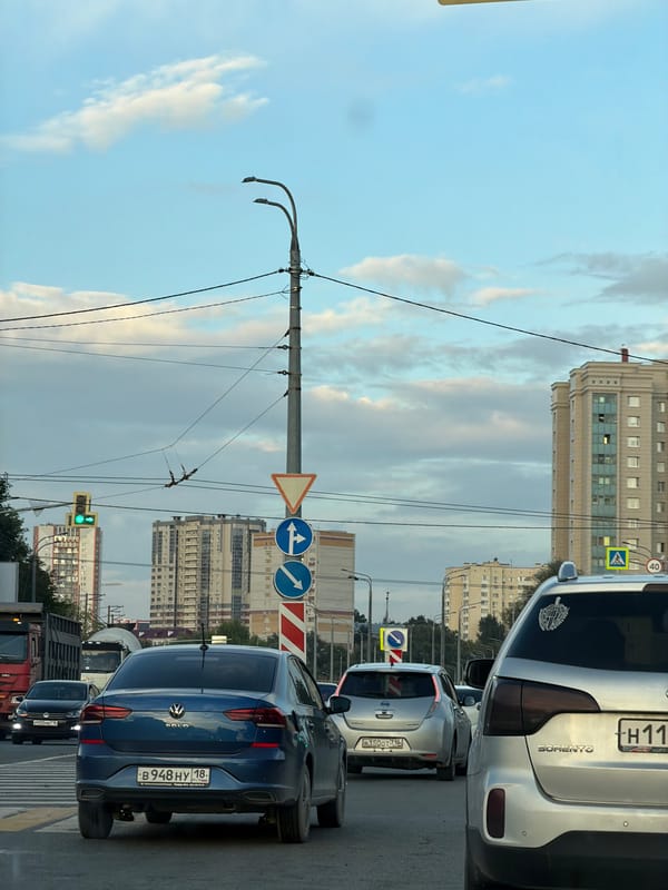 Red Kia Rio tracked through Tatarstan city traffic