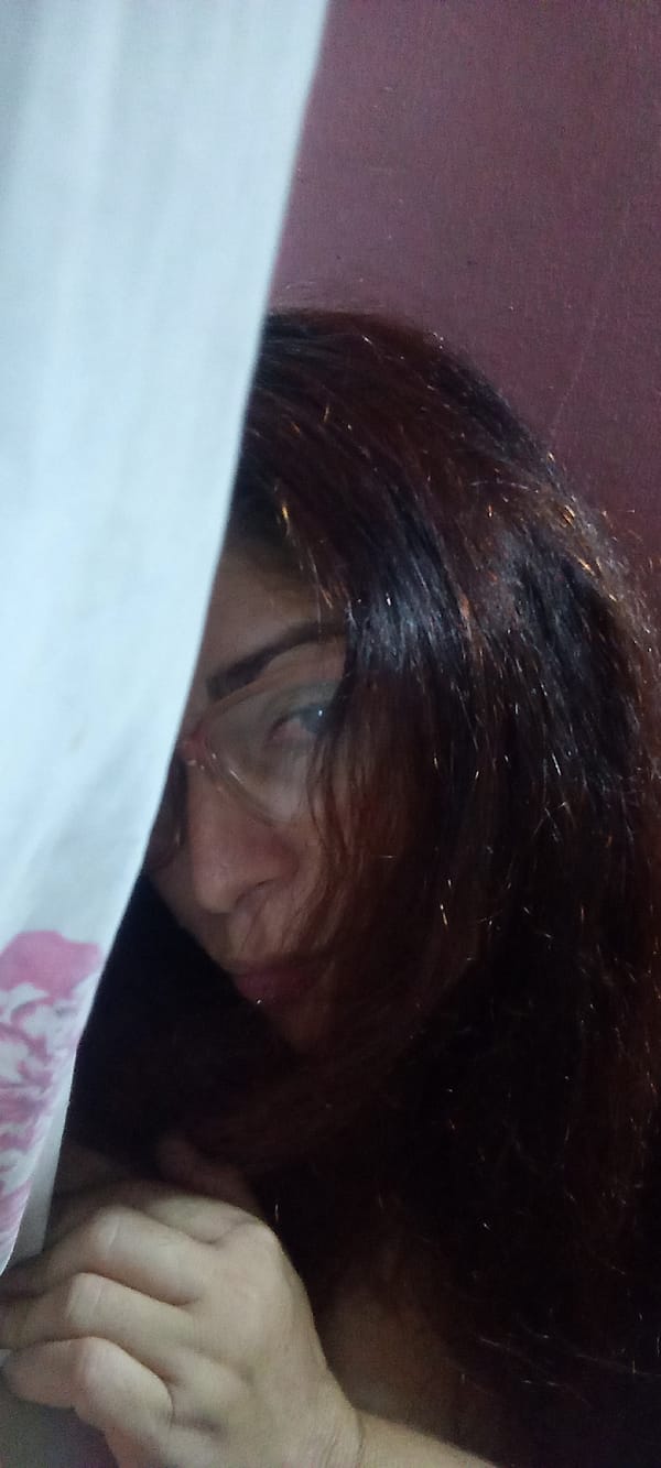 Woman behind white curtain observed by witness