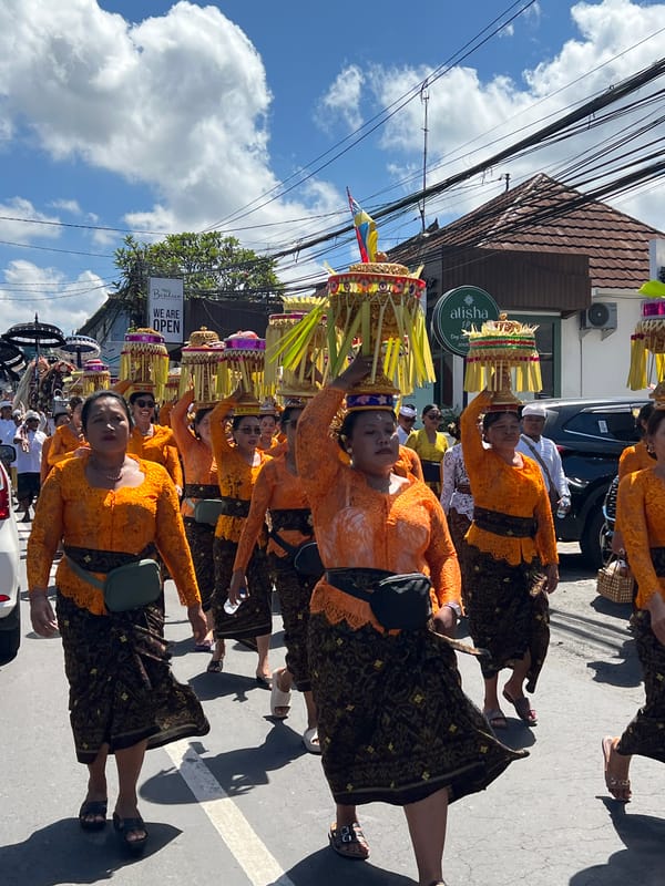 Traditional Balinese religious procession fills Ubud streets with ceremonial participants