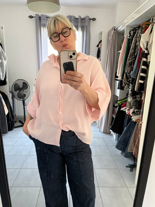 Woman documents morning routine with cat in French countryside