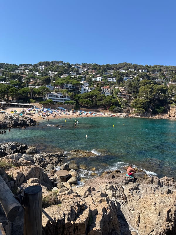 Sunny afternoon on the rocky coast of Blanes, Spain