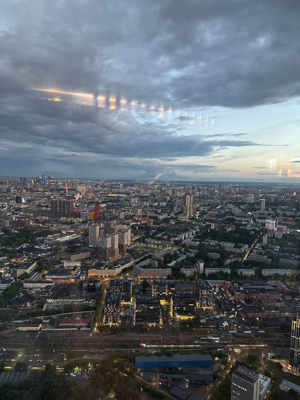 Dense city sprawl photographed from above at dusk