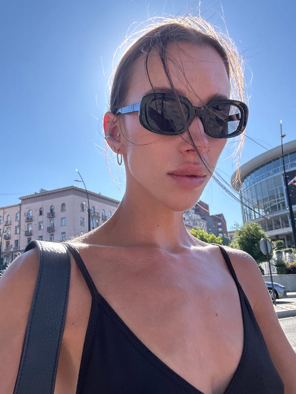 Sunny Tbilisi afternoon: street selfies and lounging dogs