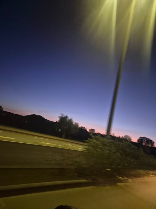 Evening drive through Mirandela captures twilight sky transition