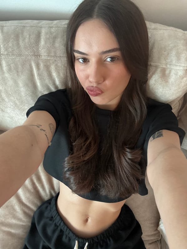 Young woman documents morning routine in Tel Aviv apartment