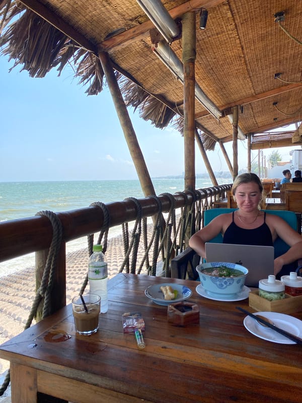 Laptop and pho at a breezy beachfront spot in Mũi Né
