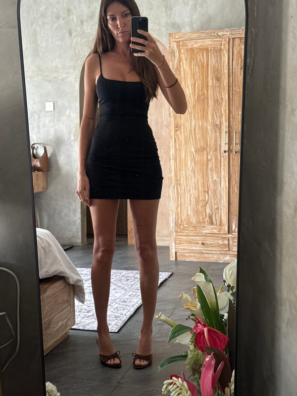 Woman takes bedroom mirror selfies in North Kuta