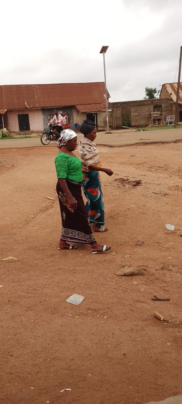 Morning street life on a dusty road in a small African town