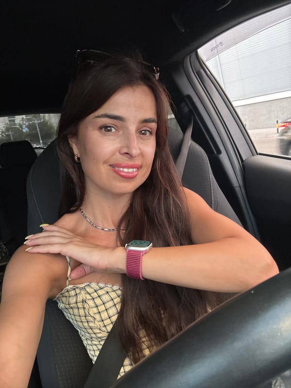 Selfie session in a Toyota, parked near an INA gas station.