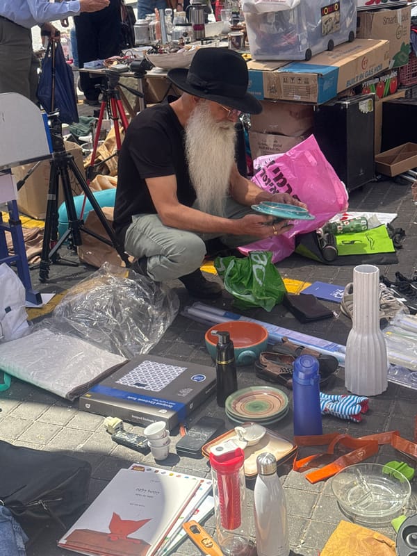 Morning flea market bustles near Tel Aviv Clock Tower