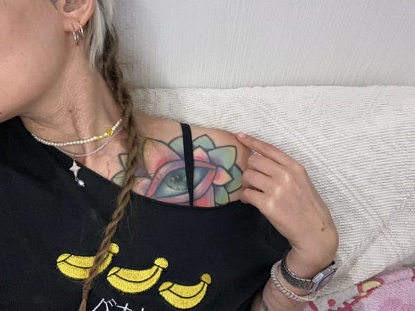 Quiet Tbilisi evening: bedroom hangout, tattoos, and ginger cats