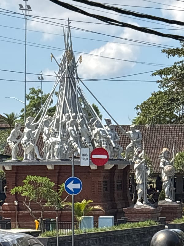 White statue structure and astronaut food mural spotted in Mengwi