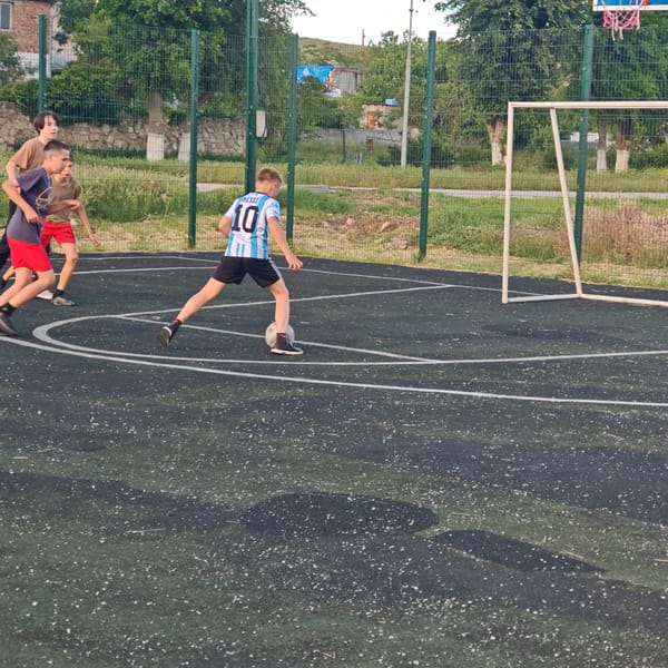 Soccer games and cycling observed in Ukrainian village
