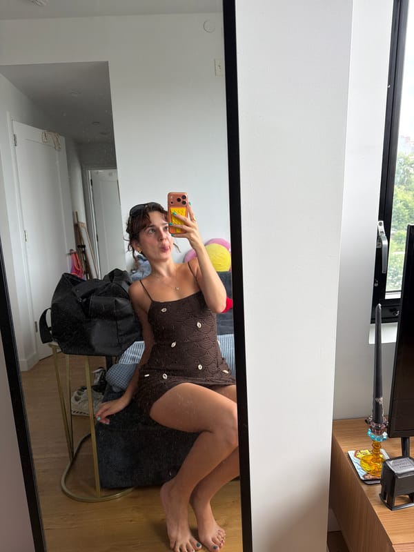 Mirror selfie in a brown crochet dress, New York