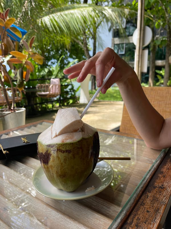 Drinks and downtime at a waterside café in Si Sunthon