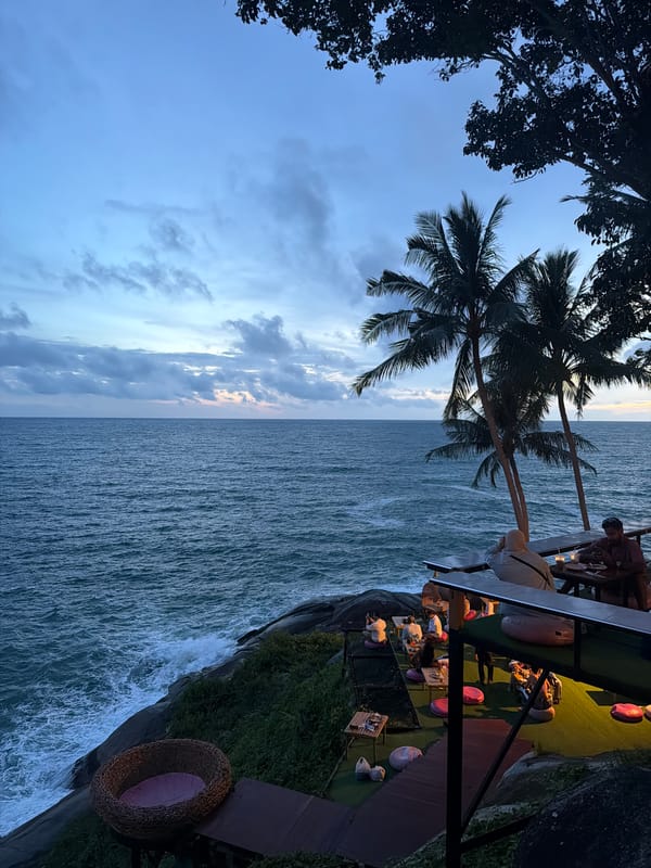 Dusk views from a clifftop bar over Patong's coastline.