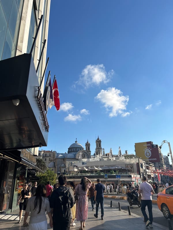 Sunny afternoon street life captured across Beyoğlu district Istanbul