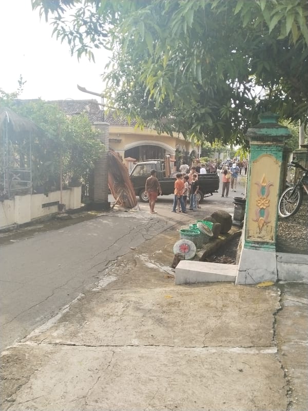 Community activities and street life documented in Gebang village