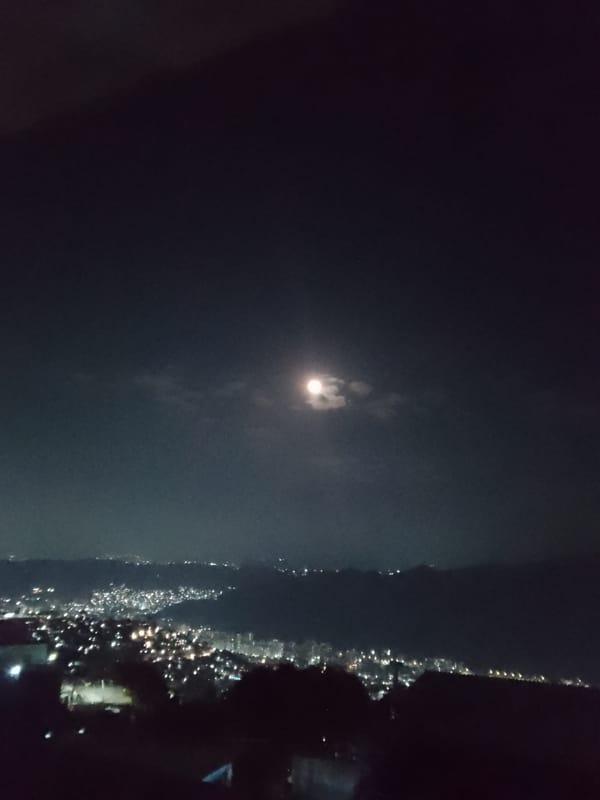 Night scenes captured across Caracas subway system, city skyline