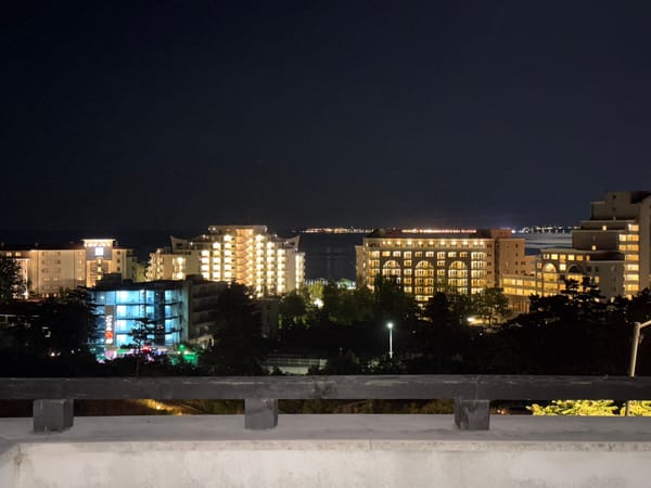 Nighttime resort pool and waterfront views from multiple angles