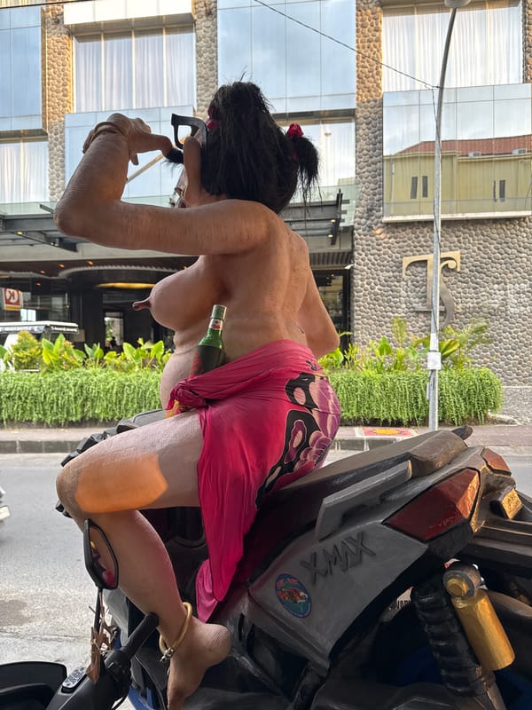 Kuta street scene: effigies, scooters, and everyday Bali