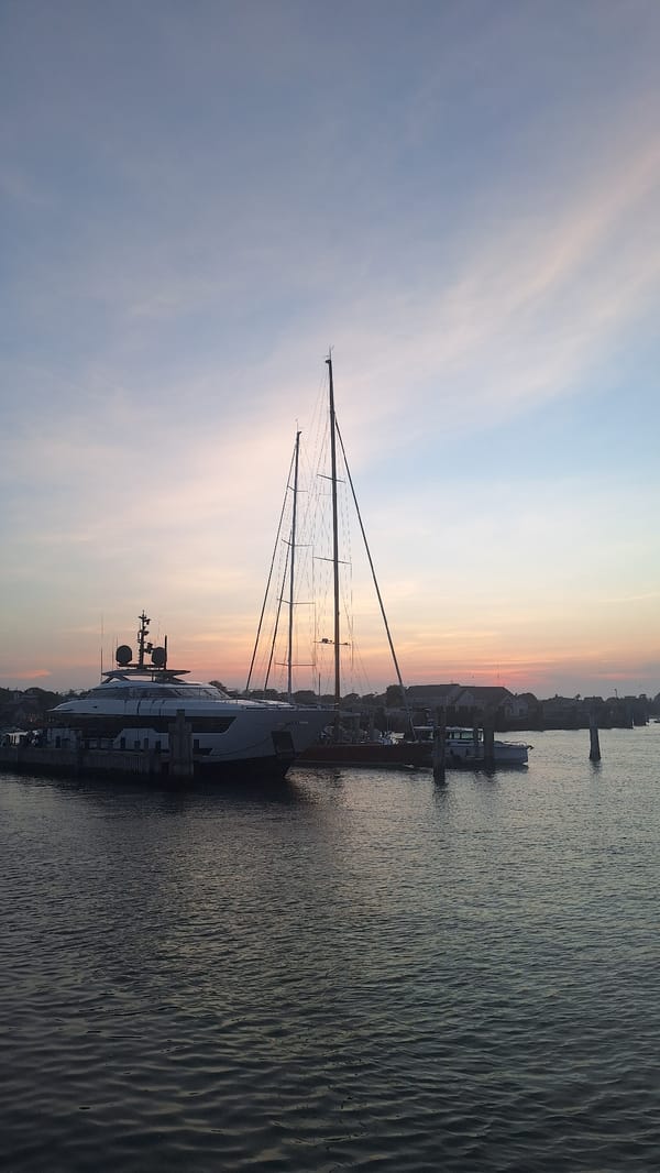 Yachts docked at Nantucket Harbor at dusk