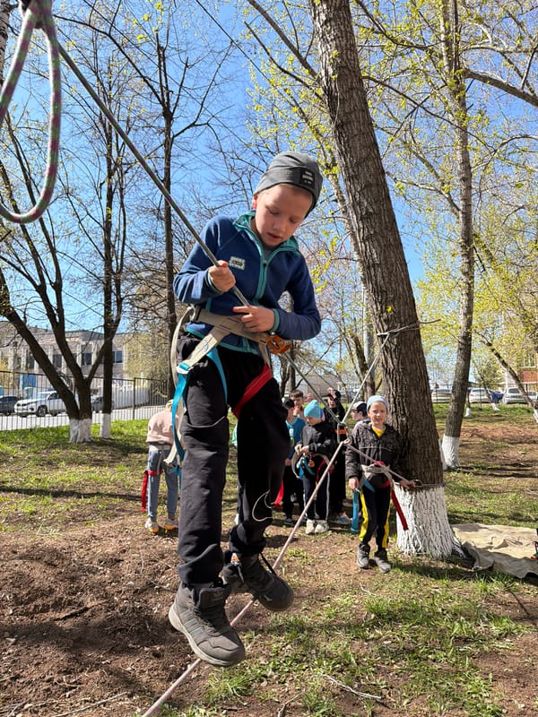 Children play and exercise in Izhevsk park morning