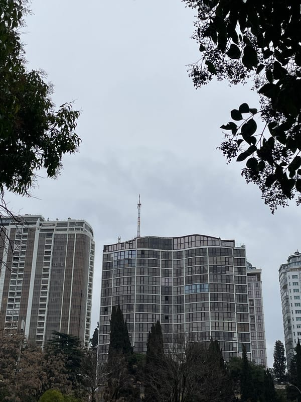 Upward view of buildings and sky captured in Sochi