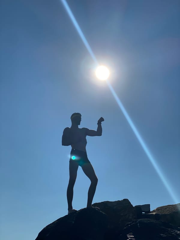 Open-water swimming and beach activity along Nha Trang's coast.
