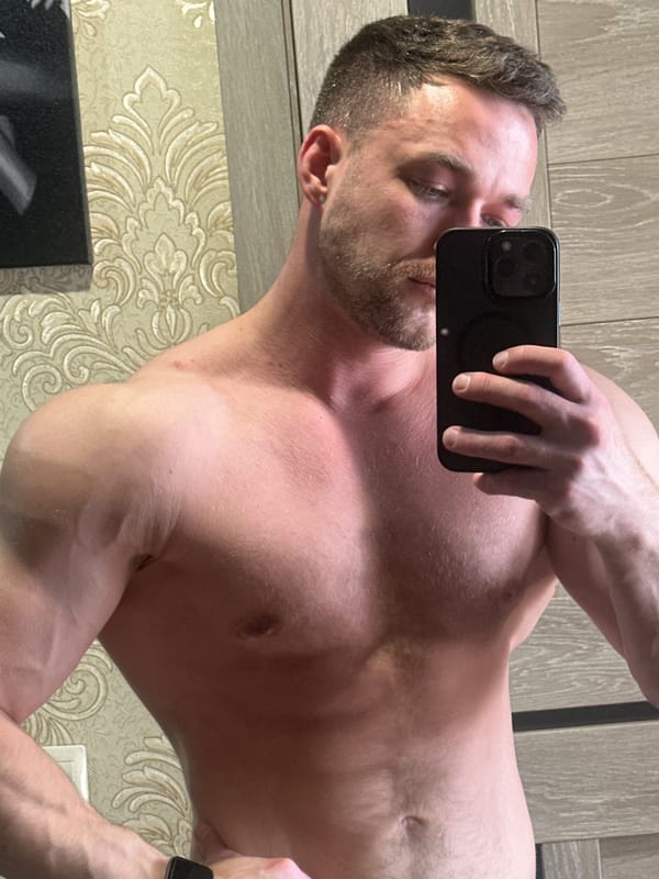 Man takes selfies indoors in Dobryanka, Russia