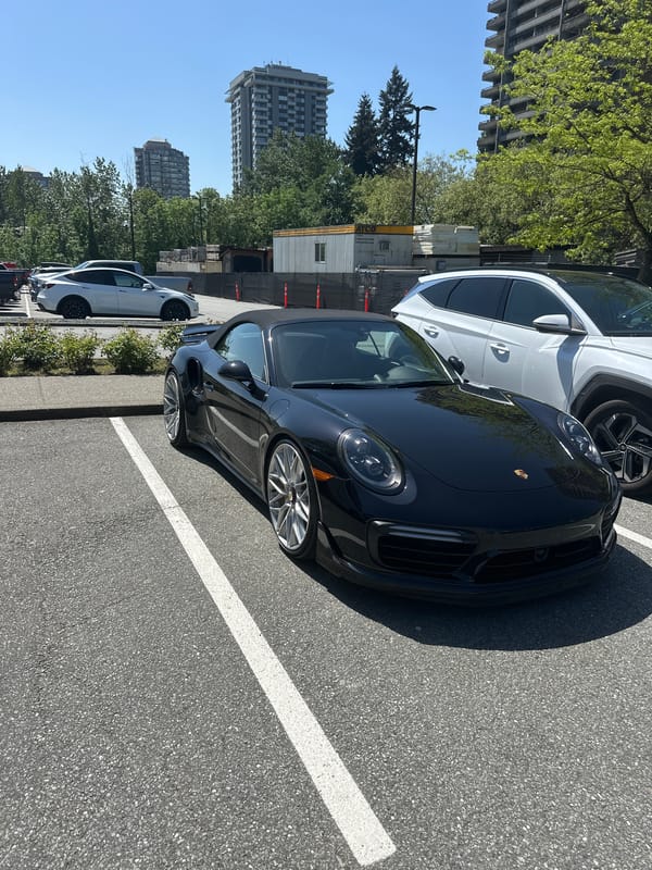 Black Porsche 911 convertible spotted parked in Burnaby