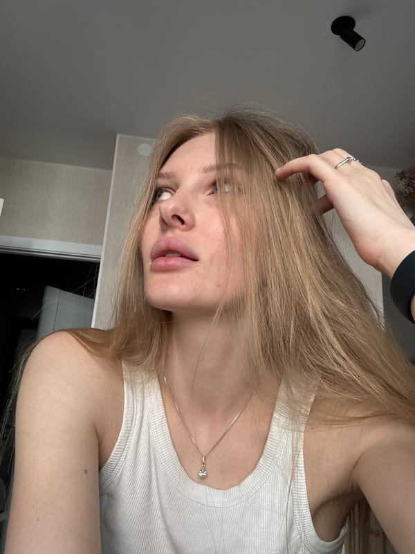 Woman takes selfies indoors in Perm, Russia