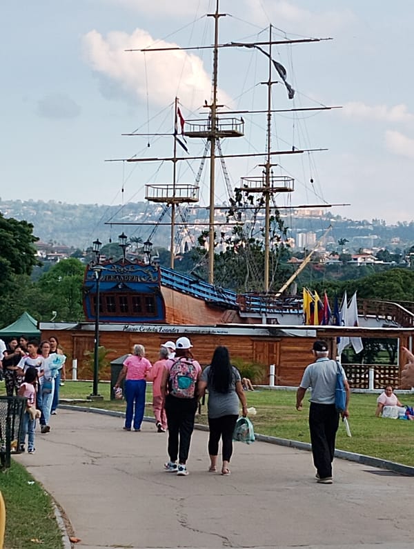 Evening visitors explore historic ship replica at Caracas park