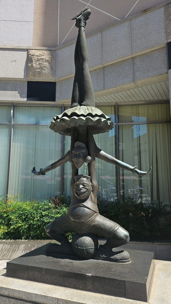 Bronze statue depicts basketball player supporting ice skater in Ulsan