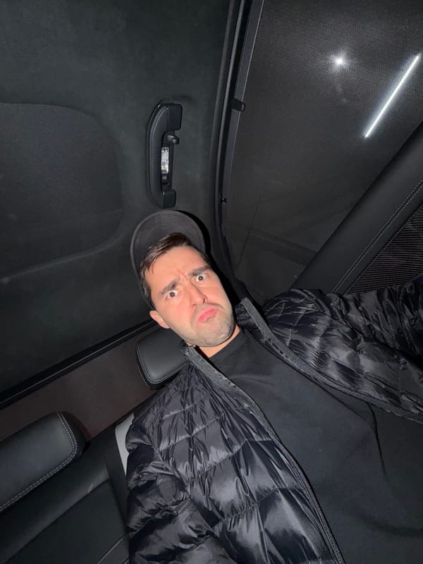 Man enters Mercedes AMG in Tbilisi parking garage